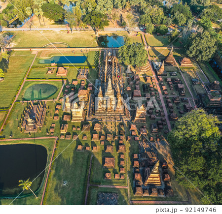 Aerial view of Wat Mahathat buddha and temple in Sukhothai Historical Park Aerial view of Wat Mahathat buddha and temple in Sukhothai Historical Park 92149746