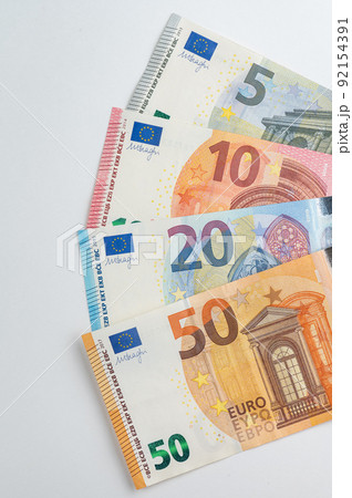 5, 10, 20, 50 euro banknotes. Money on white background 5, 10, 20, 50 euro banknotes. Money on white background 92154391