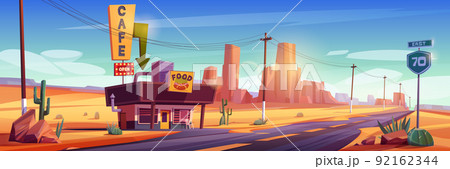 Cafe building on road in desert 92162344