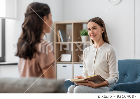 psychologist and woman at psychotherapy session psychologist and woman at psychotherapy session 92164087