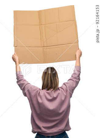 woman with poster protesting on demonstration woman with poster protesting on demonstration 92164153