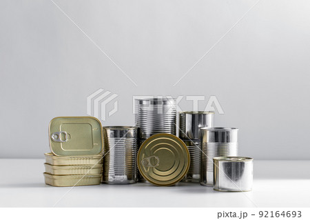 close up of tin cans with preserved food on table 92164693