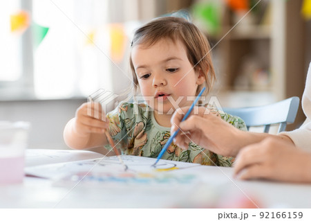 little baby girl drawing at home or kindergarten little baby girl drawing at home or kindergarten 92166159