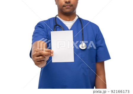 doctor or male nurse showing white paper 92166173