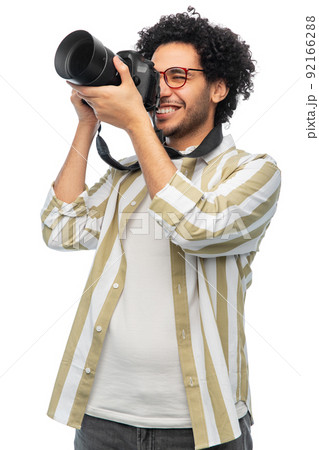 smiling man or photographer with digital camera smiling man or photographer with digital camera 92166288