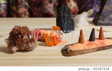 Aragonite Crystal With Incense and Stone Pyramid on Meditation Altar Aragonite Crystal With Incense and Stone Pyramid on Meditation Altar 92167318