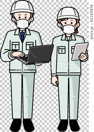 マスクをしてパソコンとタブレットを持つ作業着の男女 92169956