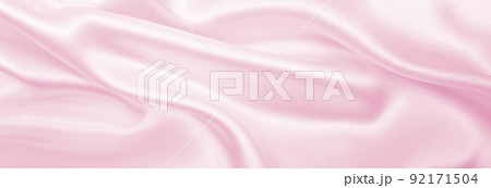 Smooth elegant pink silk or satin texture as wedding background. Luxurious background design Smooth elegant pink silk or satin texture as wedding background. Luxurious background design 92171504