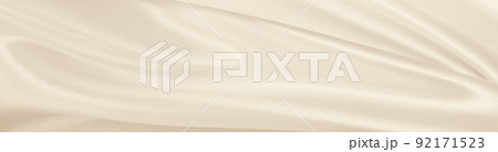 Smooth elegant golden silk or satin luxury cloth texture as wedding background. Luxurious background design. In Sepia toned. Retro style 92171523