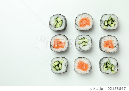 Concept of tasty food with sushi rolls on white background 92173847
