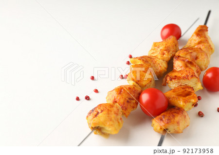 Concept of tasty food with chicken shashlik on white background Concept of tasty food with chicken shashlik on white background 92173958