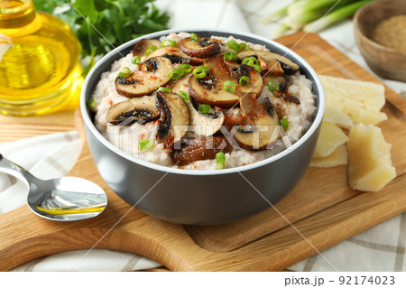 Concept of tasty food with risotto with mushrooms, close up Concept of tasty food with risotto with mushrooms, close up 92174023
