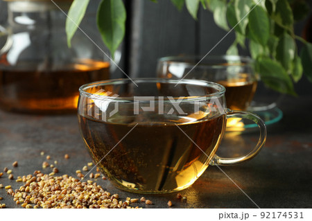 Concept of hot drink with buckwheat tea, close up Concept of hot drink with buckwheat tea, close up 92174531