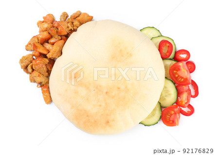 Pita and ingredients isolated on white background Pita and ingredients isolated on white background 92176829