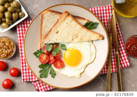 Concept of tasty breakfast on gray textured background Concept of tasty breakfast on gray textured background 92176830
