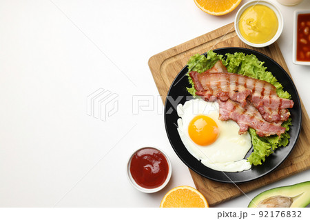 Concept of tasty breakfast on white background Concept of tasty breakfast on white background 92176832