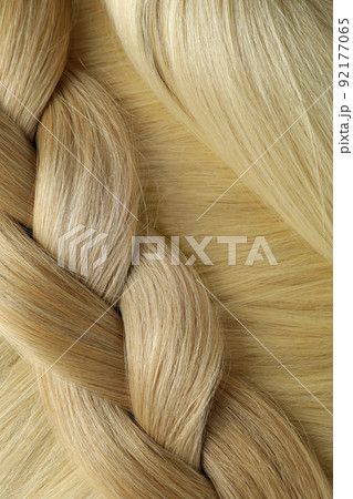 Light female hair on whole background, close up Light female hair on whole background, close up 92177065