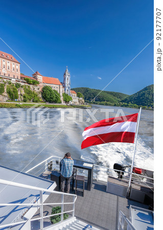 Panorama of Wachau valley (Unesco world heritage site) with ship on Danube river against Durnstein village in Lower Austria, Austria Panorama of Wachau valley (Unesco world heritage site) with ship on Danube river against Durnstein village in Lower Austria, Austria 92177707