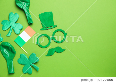 St.Patrick's Day accessories on green background, space for text St.Patrick's Day accessories on green background, space for text 92177860