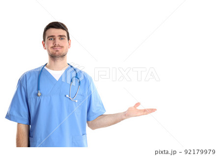 Attractive doctor intern isolated on white background Attractive doctor intern isolated on white background 92179979