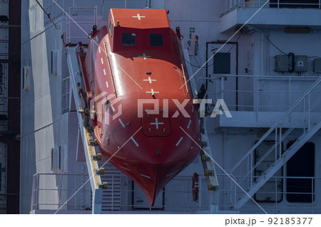 tanker container cargo ship red lifeboat vessel detail close up tanker container cargo ship red lifeboat vessel detail close up 92185377