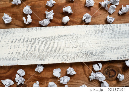Important Informations Written On Piece Of Wood With Paper Wraps Around On Floor. Crutial Announcements On Wooden Panel With Crumpled Notes All Over. Important Informations Written On Piece Of Wood With Paper Wraps Around On Floor. Crutial Announcements On Wooden Panel With Crumpled Notes All Over. 92187194