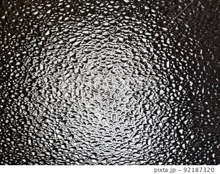 Abstract embossed white and black glass texture Abstract embossed white and black glass texture 92187320