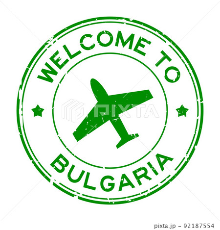 Grunge green welcome to Bulgaria word with airplane icon round rubber seal stamp on white background 92187554