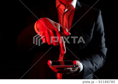 Businessman Holding Tablet And Pointing With One Finger On Important Message. Executive In Suit Presenting Crutial Information. Gentleman Showing Critical Announcement. 92188780