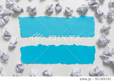 Paper Wraps Placed Around Two Important Informations. Wrinkled Notes Arranged All Over Different Crutial Announcements. Crumpled Memos With Critical Data In. 92189192
