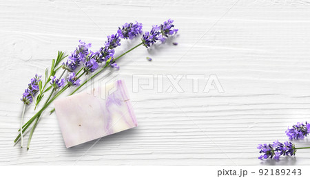 Homemade lavender soap on white wooden background. Homemade lavender soap on white wooden background. 92189243