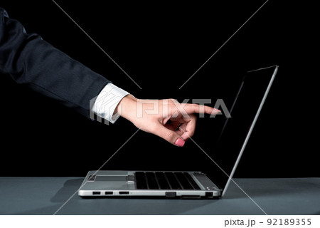 Businesswoman Pointing Important Message On Lap Top Screen. Woman Showing Crutial Information On Computer. Lady In Suit Presenting Recent Announcements. 92189355