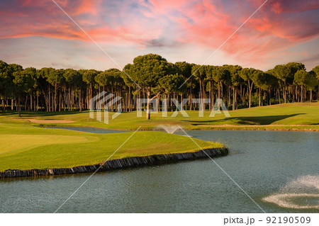 Golf course at sunset with beautiful sky 92190509