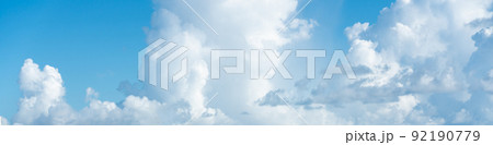 Panorama of blue sky with white clouds in clear weather 92190779