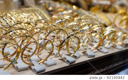A lot of gold jewelry on a shop window in Turkey A lot of gold jewelry on a shop window in Turkey 92190882