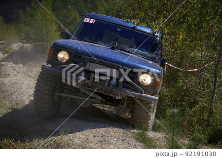 Off-road vehicle overcomes the track Off-road vehicle overcomes the track 92191030