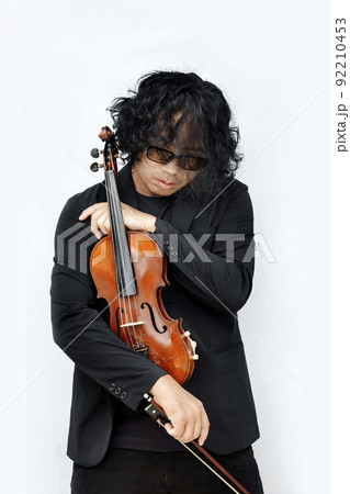 Violinist asian man play wood violin on isolated background 92210453