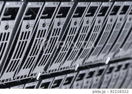 Row of hard disks used for data storage in internet data center Row of hard disks used for data storage in internet data center 92216322