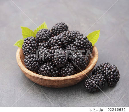 Blackberry on black board closeup. 92216632