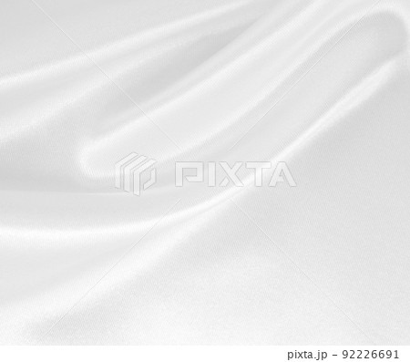 Smooth elegant white silk or satin luxury cloth texture as wedding background. Luxurious background design 92226691