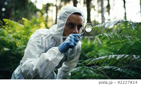 Botanist takes a plant sample for analysis in the mountains 92227814