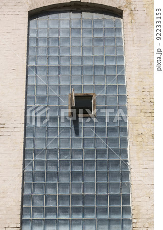 Glass decor of a brick building 92233153