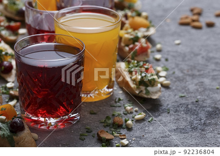 Summer drinks and toasts with fruits Summer drinks and toasts with fruits 92236804