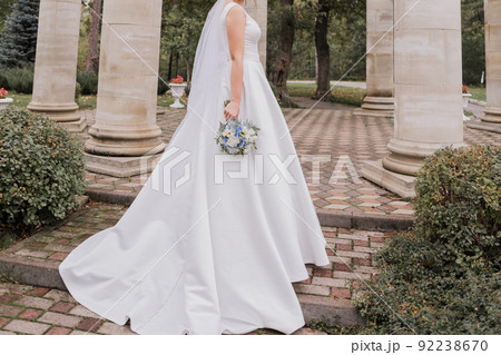 bride in a wedding dress in columns in the park bride in a wedding dress in columns in the park 92238670
