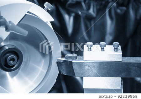 The lathe tool regrind process with abrasive stone wheel. 92239968