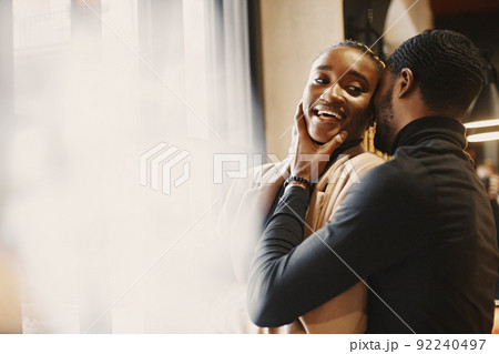Two young people in cafe. African couple enjoying the time spending with each other. 92240497