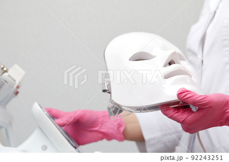 photon mask. Health and beauty. Cosmetic procedure for woman face. Beauty laboratory. LED Facial Mask, Photon Therapy photon mask. Health and beauty. Cosmetic procedure for woman face. Beauty laboratory. LED Facial Mask, Photon Therapy 92243251