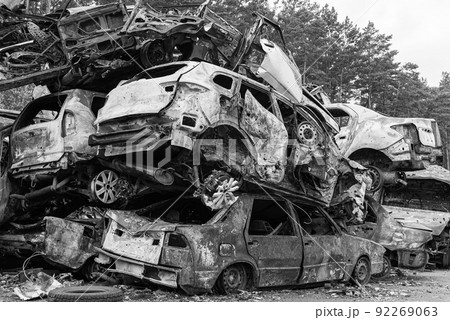 Black and white photo of the war in Ukraine - destroyed cars in Bucha district Black and white photo of the war in Ukraine - destroyed cars in Bucha district 92269063