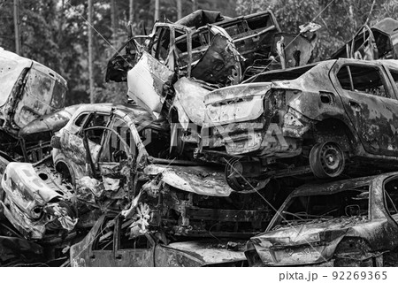 Black and white photo of the war in Ukraine - destroyed cars in Bucha district Black and white photo of the war in Ukraine - destroyed cars in Bucha district 92269365
