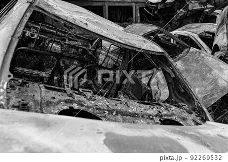 Dump of war-destroyed cars in Ukraine, black and white photo Dump of war-destroyed cars in Ukraine, black and white photo 92269532